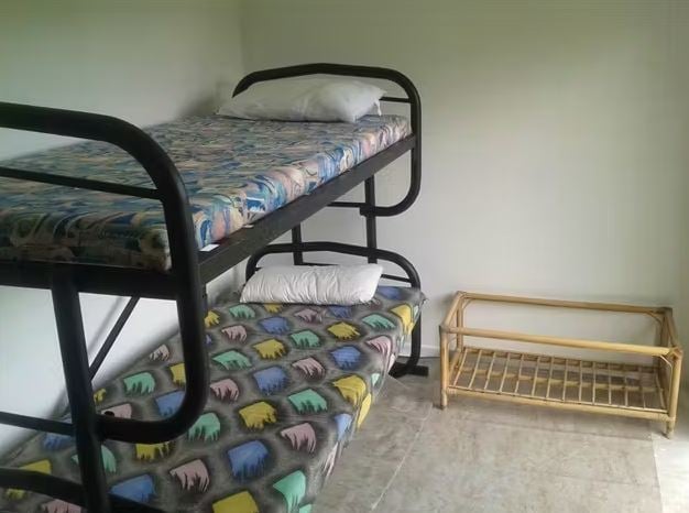 Betten beim Freiwilligenprojekt Rainforest Conservation in Neuseeland